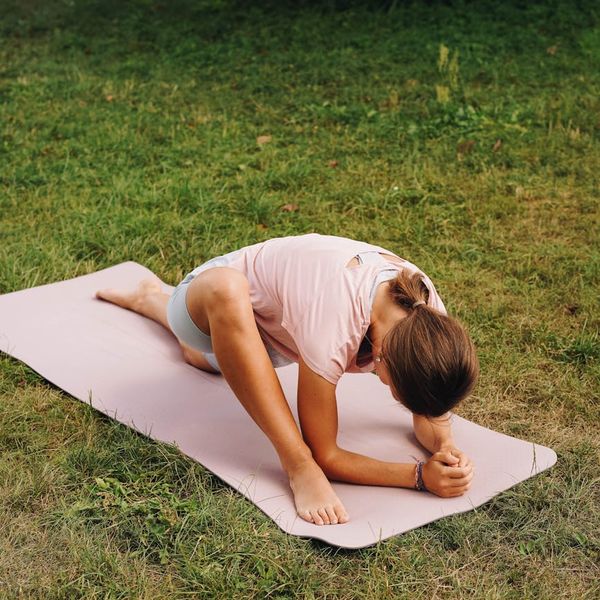 Serene person practicing deep breathing in a calm setting.